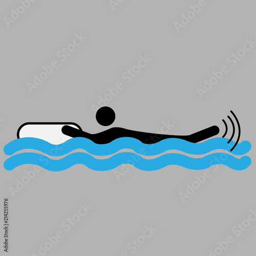 Silhouette of a person floating on waves