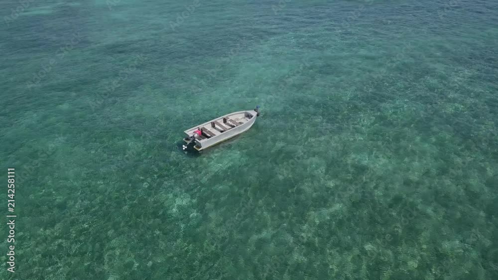 Aerial drone shot on smalll fishing boat