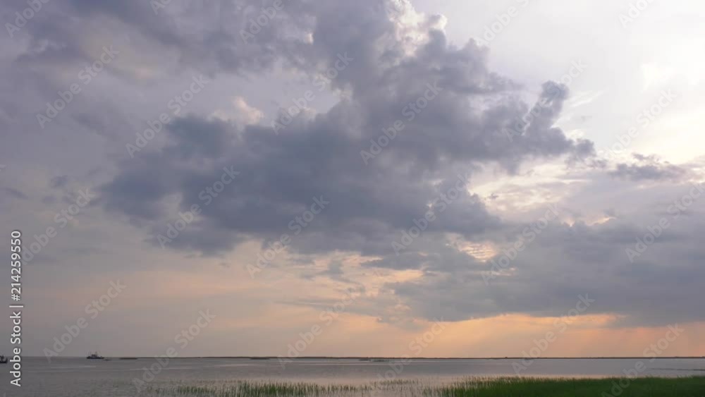 Clouds float above the boats Clouds float above the boats