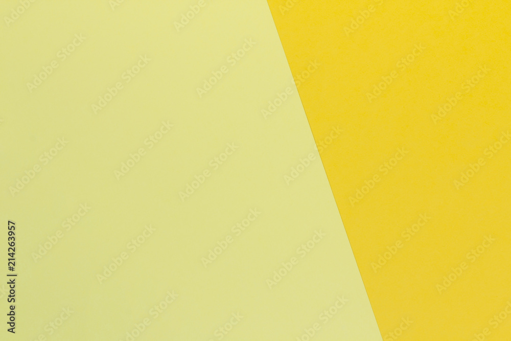 Creative geometric paper background. Pattern of similar (monochrome) shades of yellow. Abstraction. Flat lay. Creative geometric paper background. Pattern of similar (monochrome) shades of yellow. Abstraction. Flat lay.