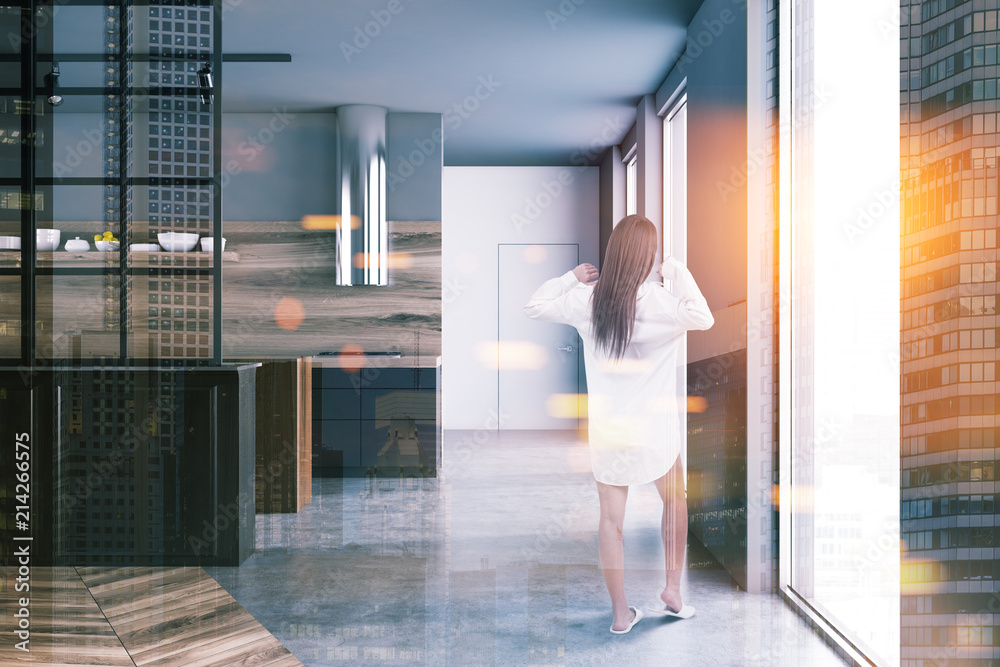 Gray loft luxury kitchen interior, woman