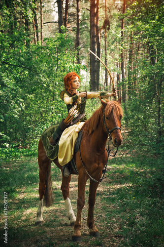 Fantasy medieval woman hunting in forest © gilitukha