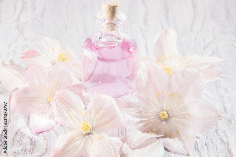 Perfume bottle and white flowers Perfume bottle and white flowers