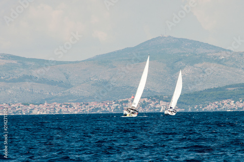 Sailboats sailing among the many beautiful islands of Croatia. Hvar, Brac, Vis, Korčula. 
