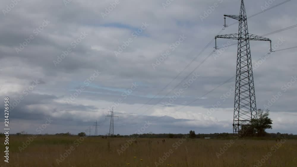 HD time lapse of thunder sky with power transmission tower in frame. Footage of high voltage pillar on thunder sky background HD time lapse of thunder sky with power transmission tower in frame. Footage of high voltage pillar on thunder sky background