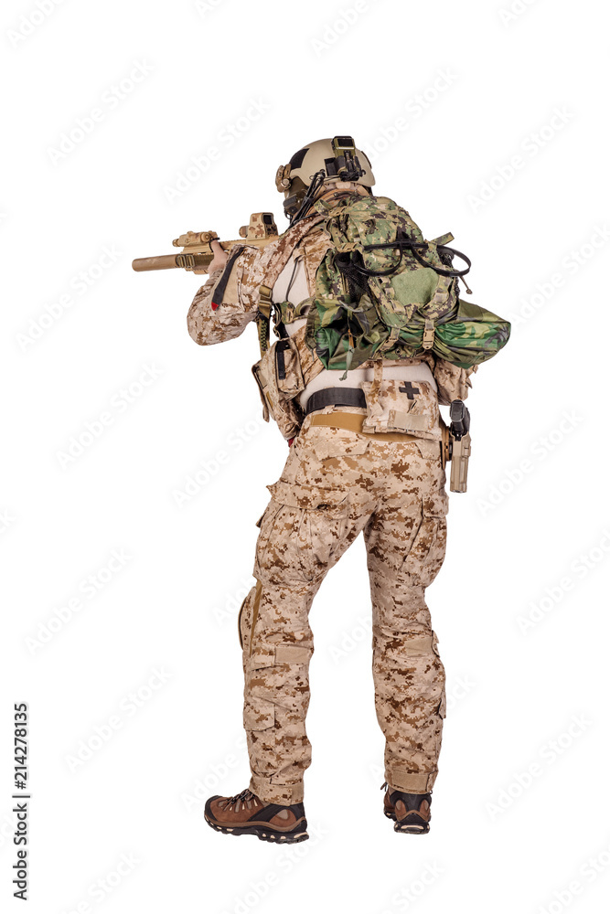 Special forces soldier with rifle on white background. army, military and people concept Special forces soldier with rifle on white background. army, military and people concept