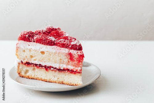 Strawberry cake on a white background.High key