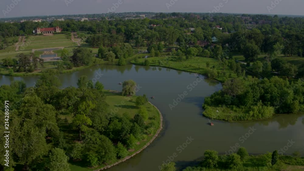 Flyover a lake and paddle boats in Forest Park Flyover a lake and paddle boats in Forest Park