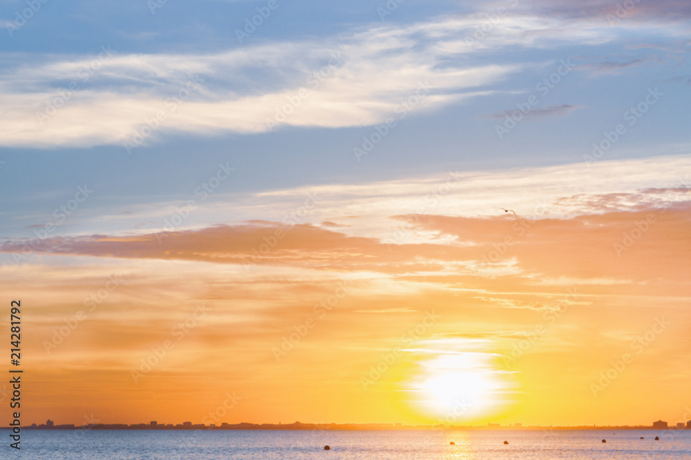 Fototapeta premium Beautiful summer sunset with clouds over the sea