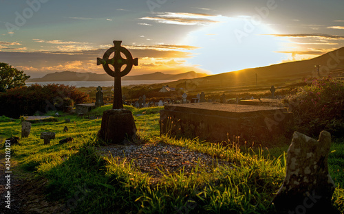 Sunset in a cemetery on the Dingle Peninsula, Co. Kerry in Ireland.