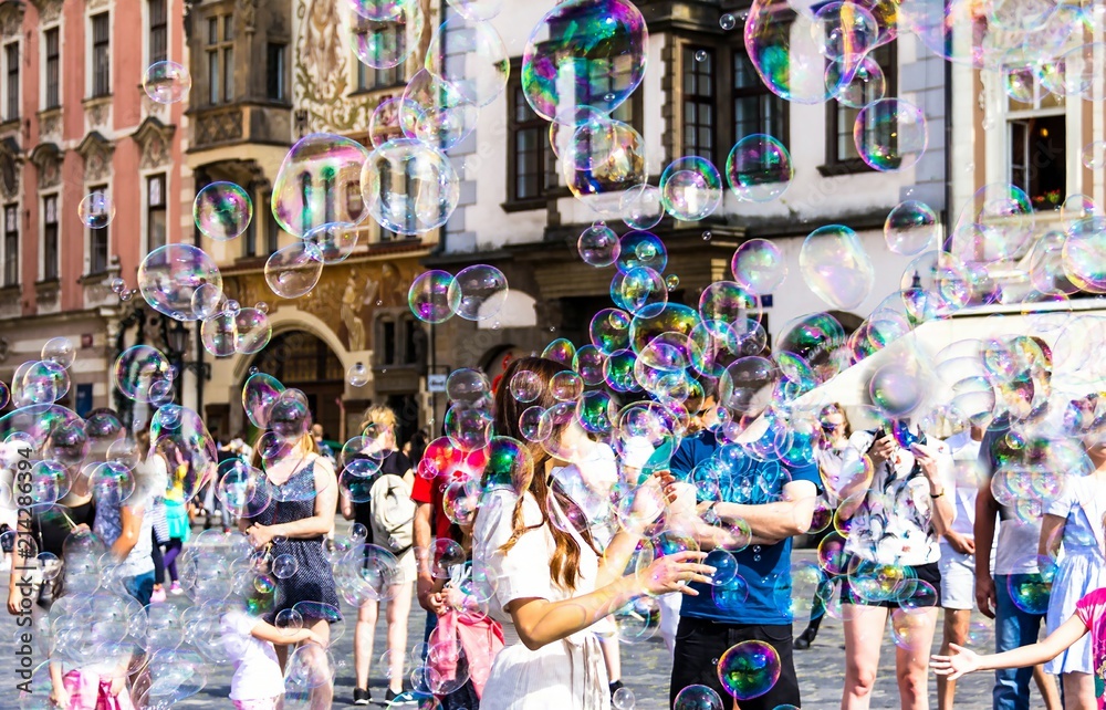 Street performer making soapy bubbles at Old Town Square. Prague