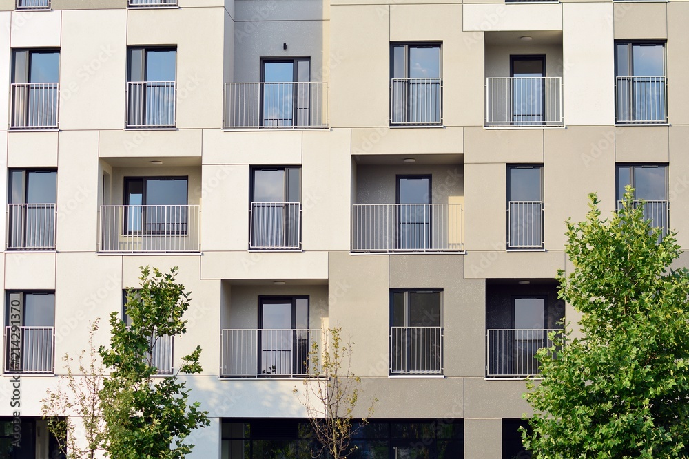 Fototapeta premium Brand new apartment building on sunny day