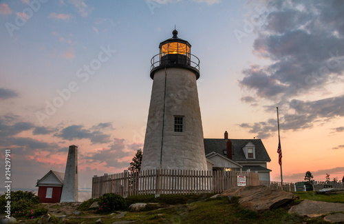 Pemaquid Point Lighthouse at sunset during a calm summer evening in Bristol, Maine