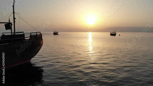 Schilderij op canvas Ships in the Sea of Galilee