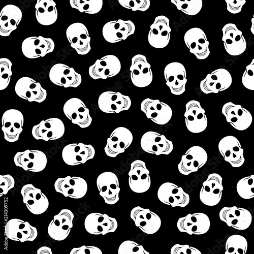 Fototapeta Naklejka Na Ścianę i Meble -  Seamless pattern white skulls on a black background