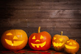 pumpkins on wooden background with copy space