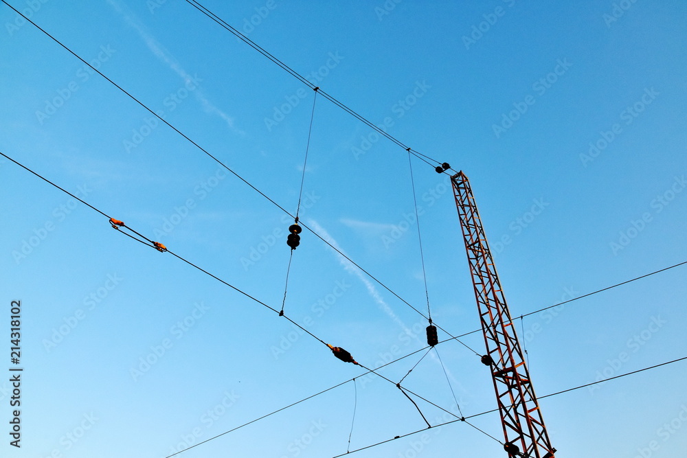 Wires at the railway station against the beautiful sky. Krasnoyarsk. Russia. Copy space for you text Wires at the railway station against the beautiful sky. Krasnoyarsk. Russia. Copy space for you text