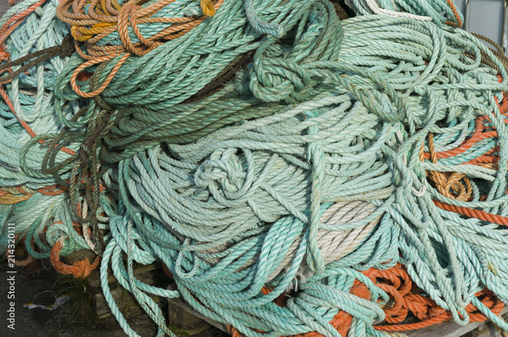 Colorful fish nets, ropes and other fishing equipment in Norway