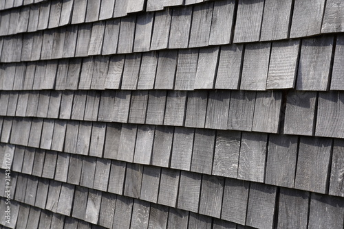 Wooden grey shingles of a roof