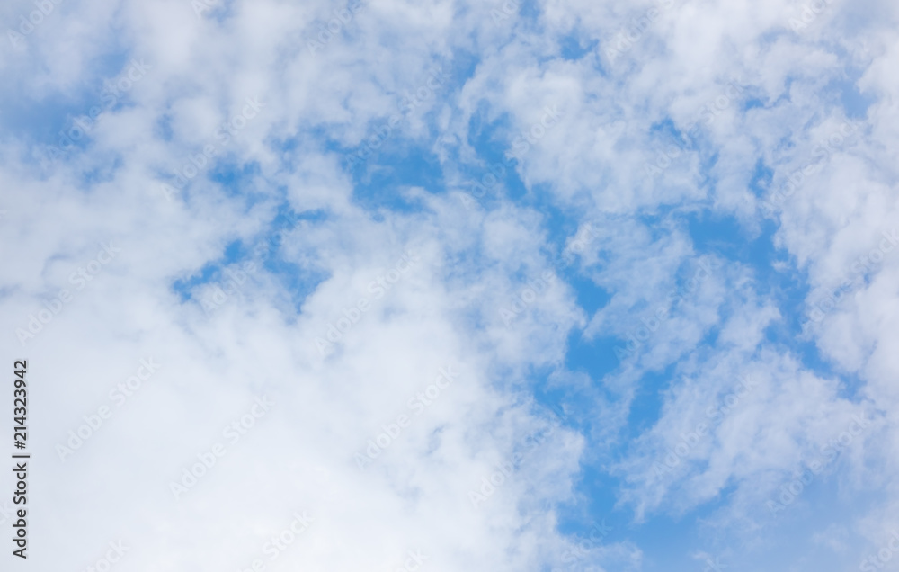 clear blue sky with white clouds on good weather.blue sky on sunlight background.skyscape.cloudscape.beautiful vast blue sky and fluffy clouds with some space.
