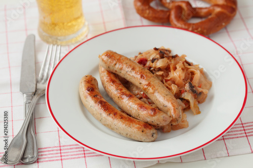 Grilled sausages with braised cabbage and beer