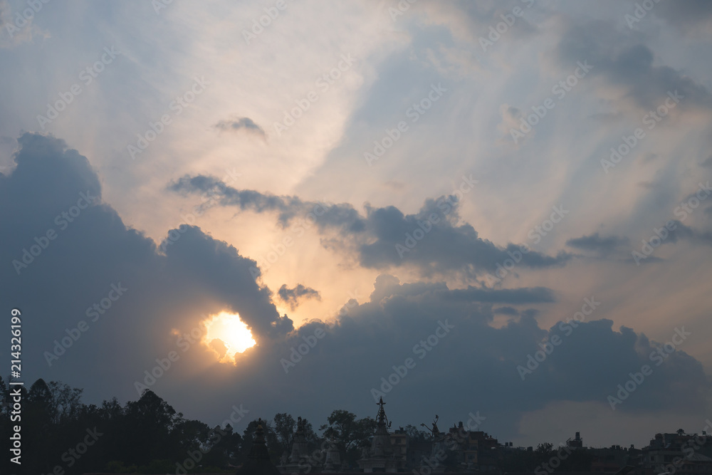 Fototapeta premium Sunlights penetrating through clouds