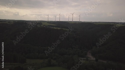 Incredible view from above of windmills, gifts from nature, ecology. Schleiden, Germany, Europe. Fields and forests