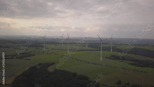  Fantastic view from above on windmills, gifts from nature, ecology. Germany, Europe