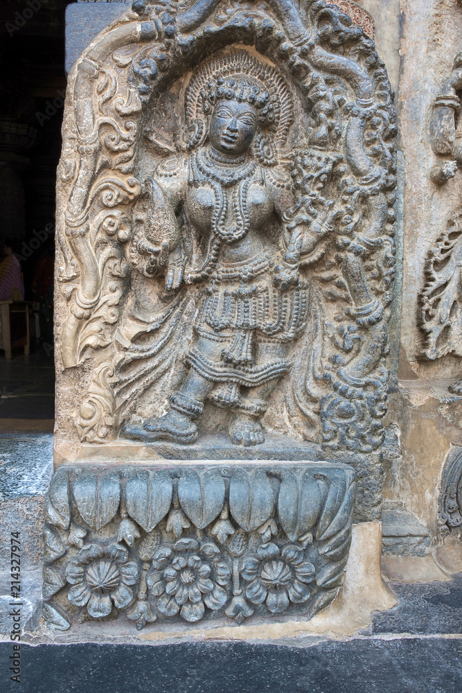 Sculpture of the Rati, Consort of Kamadeva, at the Eastern entrance of Chennakeshava temple, Belur, Karnataka.