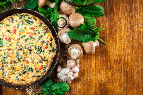 Frittata made of eggs, mushrooms and spinach