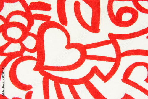 Fabric with red pattern and with heart. Background.