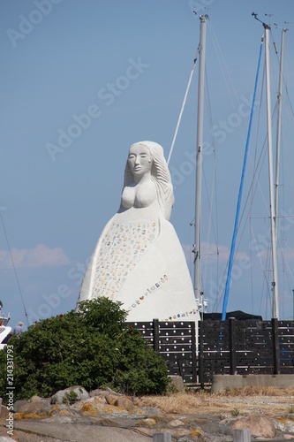 Statue Fru Fra Havet, also known as Lady From the Sea. Saeby harbour, Denmark.
