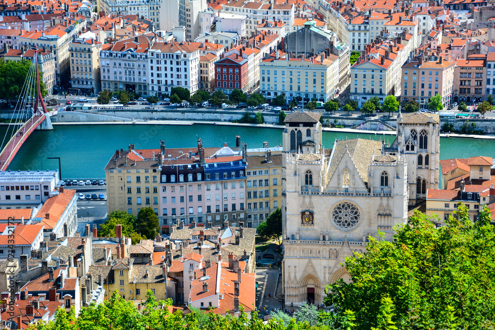 View of Vieux Lyon with the Saint Jean Cathedral and the banks of the Saone river from the Fourviere Hill. The old town of Lyon, France, is a popular tourist attraction