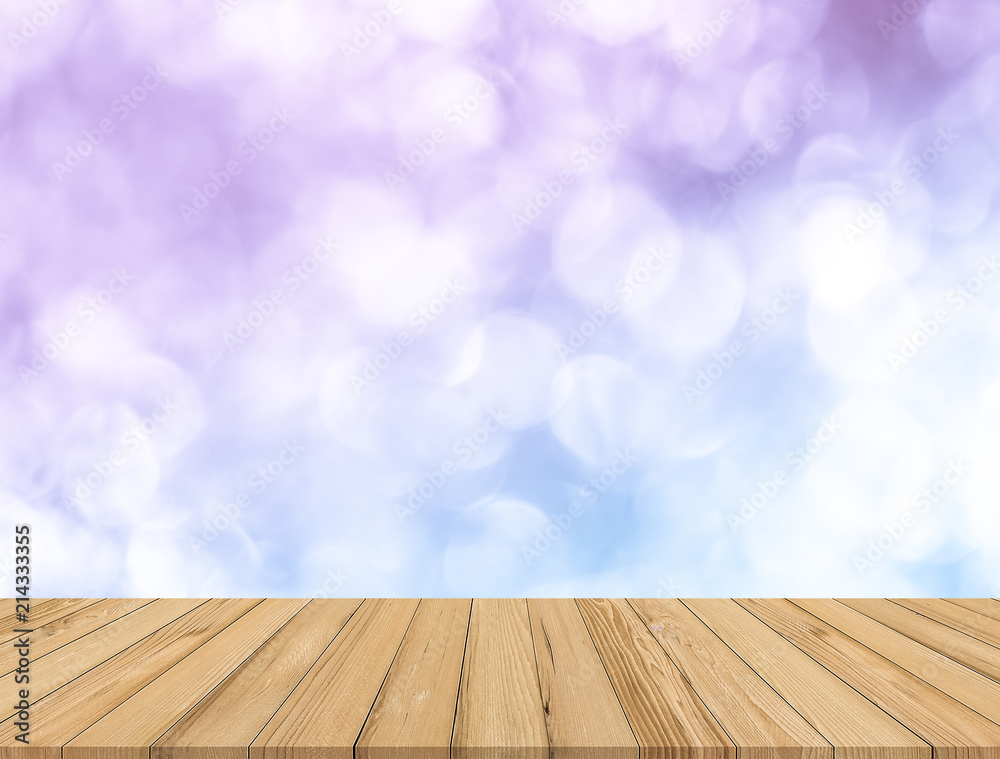 Wood plank with abstract blue blurred bokeh background for product display Keyword here