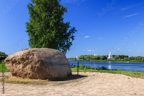 Veliky Novgorod, Russia. Rurik Settlement (Rurik Gorodishche), the archaeological monument of the IX century. On the horizon the ancient Yuryev monastery. photo