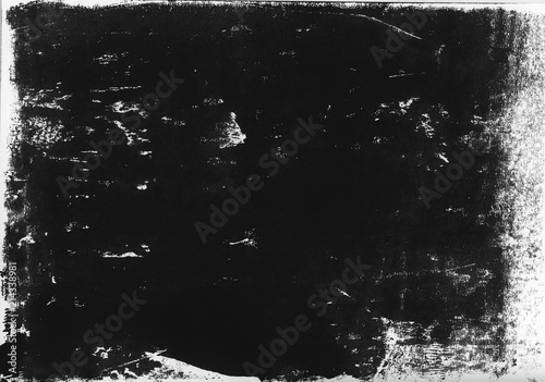 A high resolution scan of a black and white distressed lino print texture. Ideal for use as a background texture or for applying an aged or vintage effect to graphics.