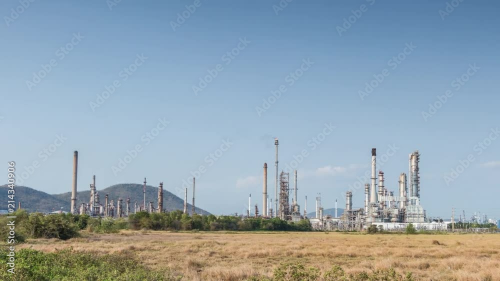 Time lapse of oil refinery industrial plant of day time Time lapse of oil refinery industrial plant of day time