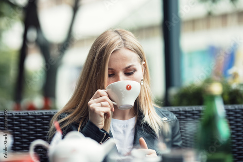 A cup of green or black tea is perfect when you want to relax with yout best friends on a autumn day at your preferate pub. photo