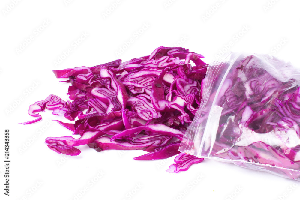 Plastic bag with frozen red cabbage slices isolated on white. Vegetable preservation Plastic bag with frozen red cabbage slices isolated on white. Vegetable preservation