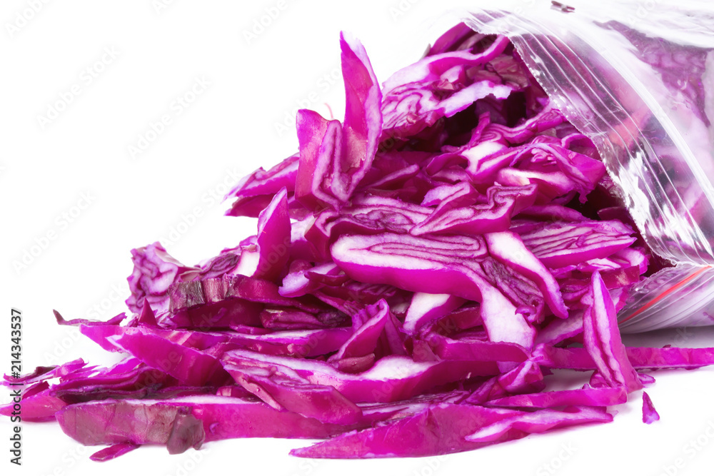 Plastic bag with frozen red cabbage slices isolated on white. Vegetable preservation Plastic bag with frozen red cabbage slices isolated on white. Vegetable preservation