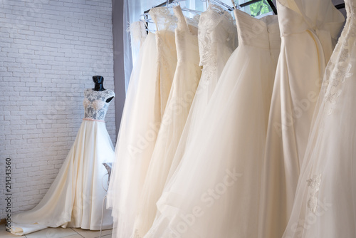  Collection of wedding dresses in the shop © illustrissima