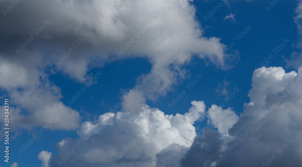 Obraz premium Blue sky with white clouds. Nature background.