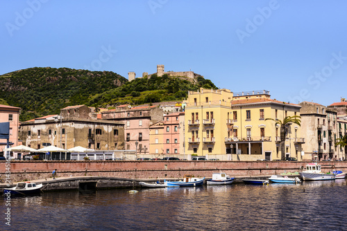 Mediterranean houses and Serravalle's castle on the shore of Tremo River in beautiful Bosa, Sardinia, Italy