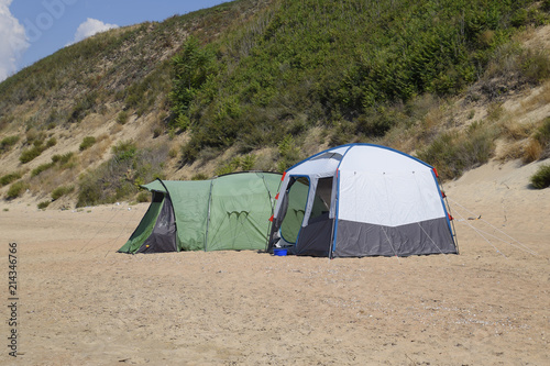 Tourist tent on the sand. Parking of tourists on the sandy beach © eleonimages