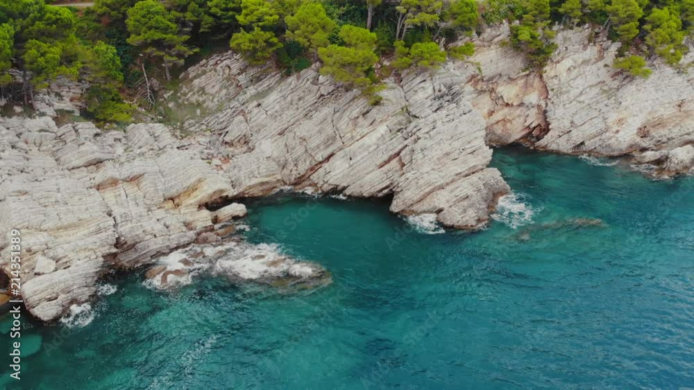 flight over rocky shore of Adriatic Sea, drone shot