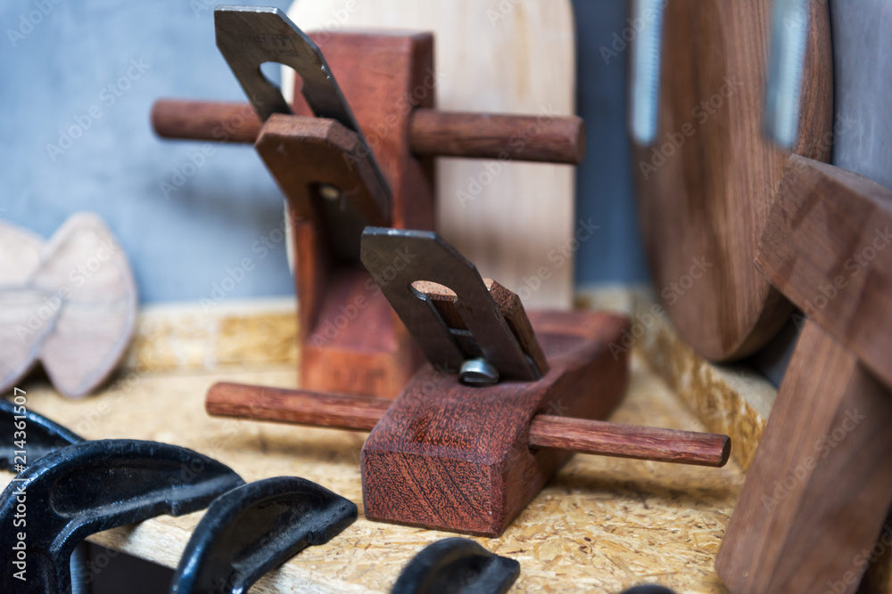 Carpenters tool on the table, wood plane,clamp Carpenters tool on the table, wood plane,clamp
