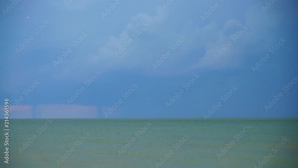 Tornado and lightnings in the sky over the sea. Tornado and lightnings in the sky over the sea.