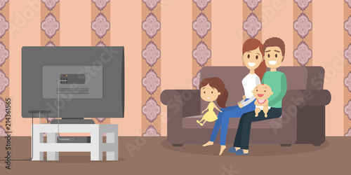 Family watching tv in the living room