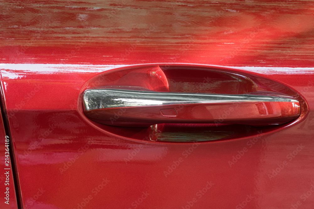 red door of a luxury car