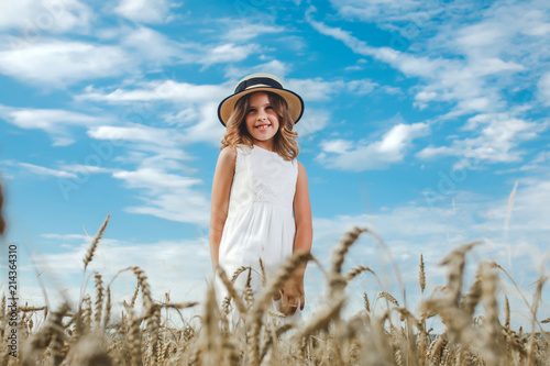 Girl. Field. The young model. Smile. Happiness. Sky. Happy moments